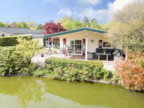 Prachtige vakantiewoning aan water met grote tuin